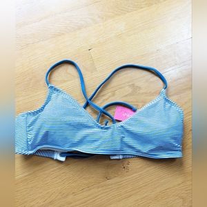 Women's bathing suit top. Size Medium. Blue and white stripes.